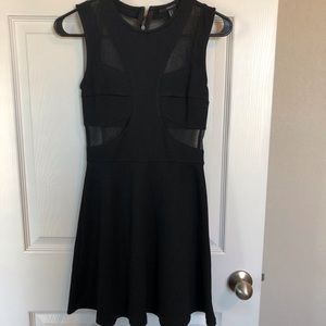 Black minidress with mesh detail